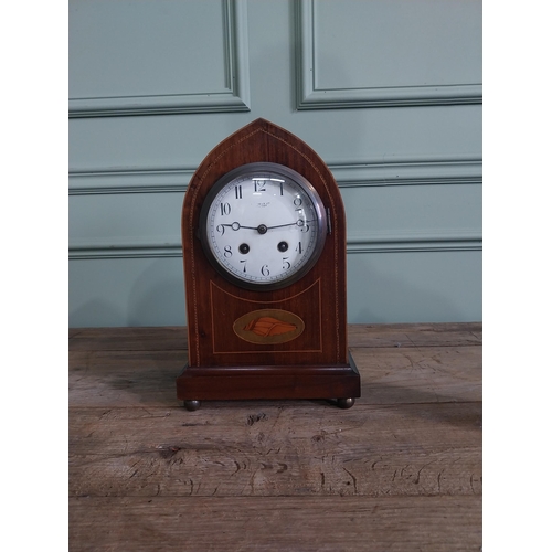 1300 - Edwardian mahogany and satinwood inlaid mantle clock with enamel dial {31 cm H x 20 cm W x 13 cm D}.