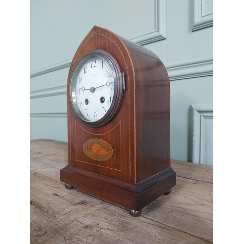 1300 - Edwardian mahogany and satinwood inlaid mantle clock with enamel dial {31 cm H x 20 cm W x 13 cm D}.