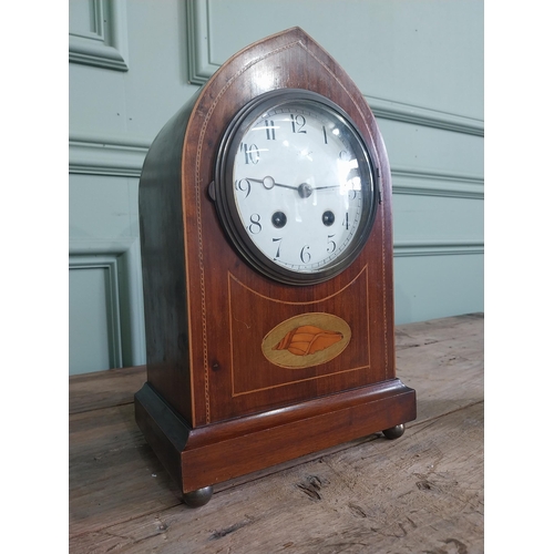 1300 - Edwardian mahogany and satinwood inlaid mantle clock with enamel dial {31 cm H x 20 cm W x 13 cm D}.