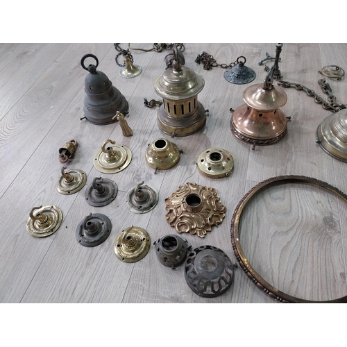 1308 - Collection of early 20th C. brass and copper lighting ceiling hoods, fittings and chains.