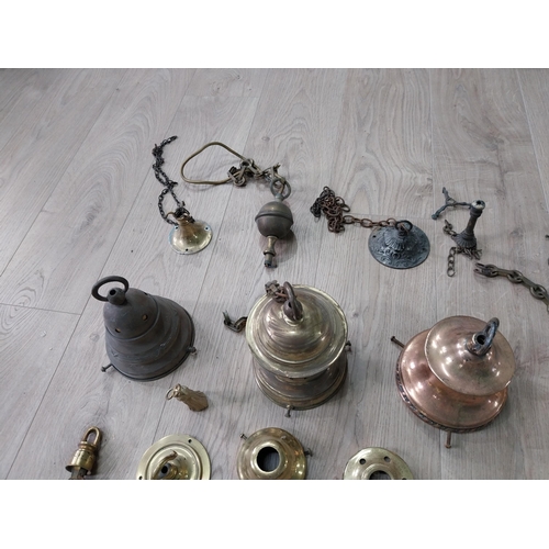 1308 - Collection of early 20th C. brass and copper lighting ceiling hoods, fittings and chains.