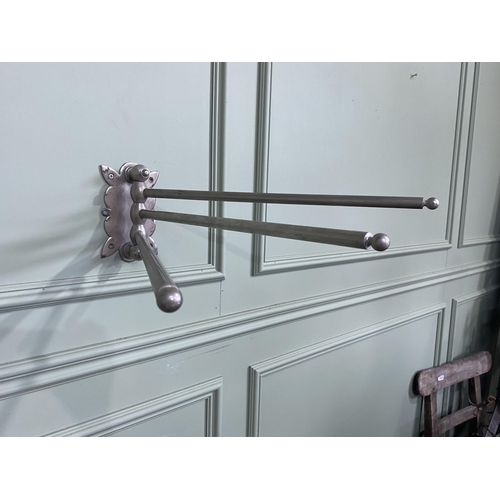 1315 - Early 20th C. chrome wall mounted adjustable towel rail {17 cm H x 50 cm W}.