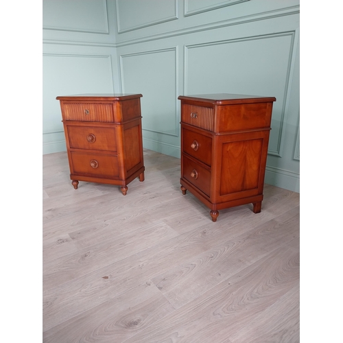 1323 - Pair of cherry wood bedside cabinets with three drawers raised on turned legs {69 cm H x 50 cm W x 3... 