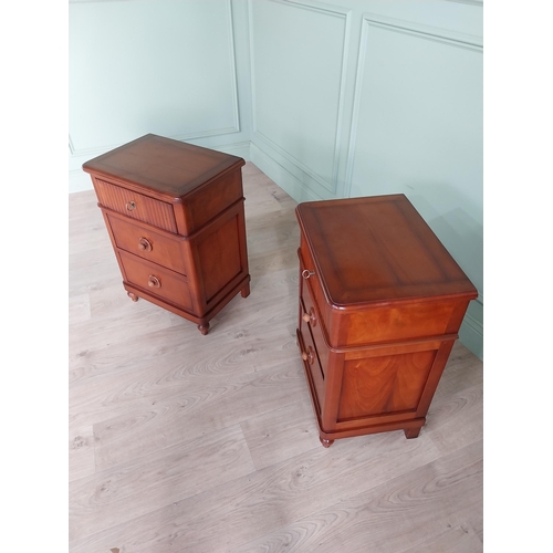 1323 - Pair of cherry wood bedside cabinets with three drawers raised on turned legs {69 cm H x 50 cm W x 3... 