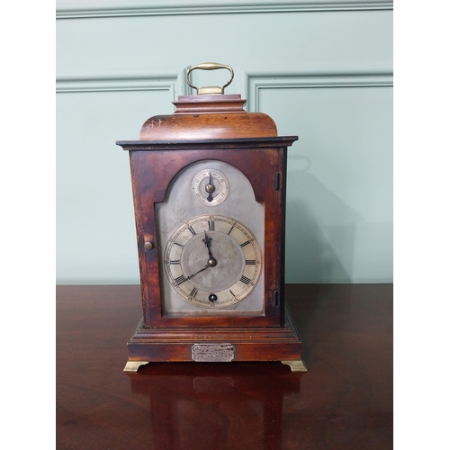 133 - Early 20th C. mahogany bracket clock with silvered dial mounted with silver plaque presented to Reve... 