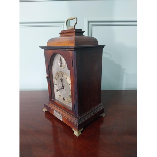 133 - Early 20th C. mahogany bracket clock with silvered dial mounted with silver plaque presented to Reve... 