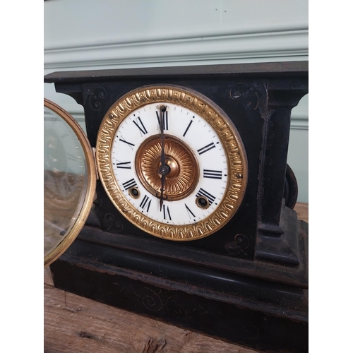 1346 - Edwardian ebonised metal mantle clock with enamel and brass dial {25 cm H x 29 cm W x 12 cm D}.