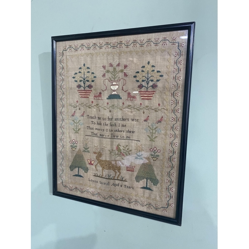 136 - 19th C. Louisa Sawell (aged 8 years) embroidered sample mounted in ebonised frame {41 cm H x 33 cm W... 