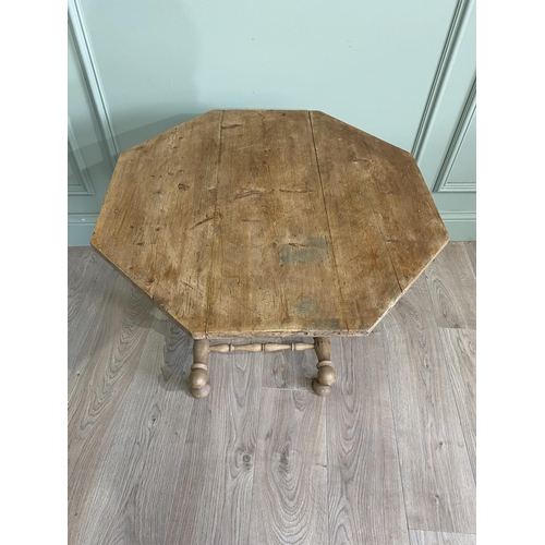 1360 - 19th C. pine wine table raised on turned supports and platform base {61 cm x 67 cm W x 68 cm D}.