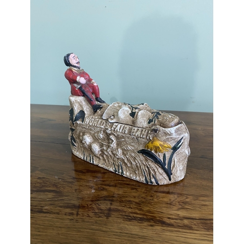 1381 - Decorative cast iron novelty money box {16 cm H x 21 cm W x 7 cm D}.