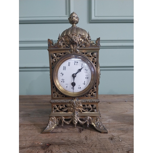 1386 - 19th C. decorative gilded brass mantle clock with enamel dial {32 cm H x 16 cm W x 16 cm D}.