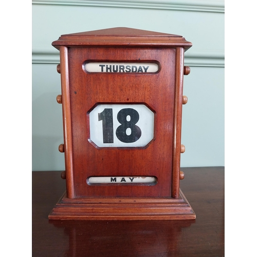 1399 - Early 20th C. mahogany perpetual desk calendar {27 cm H x 20 cm W x 9 cm D}.