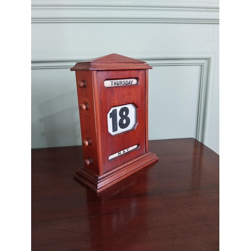 1399 - Early 20th C. mahogany perpetual desk calendar {27 cm H x 20 cm W x 9 cm D}.