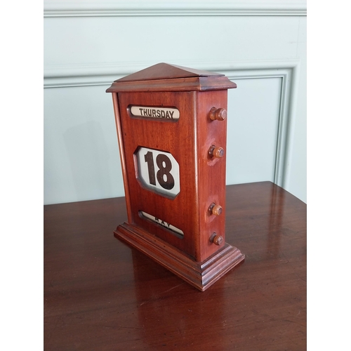 1399 - Early 20th C. mahogany perpetual desk calendar {27 cm H x 20 cm W x 9 cm D}.