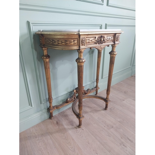 1401 - Good quality giltwood console table with marble top raised on reeded legs. {102 cm H x 95 cm W x 42 ... 