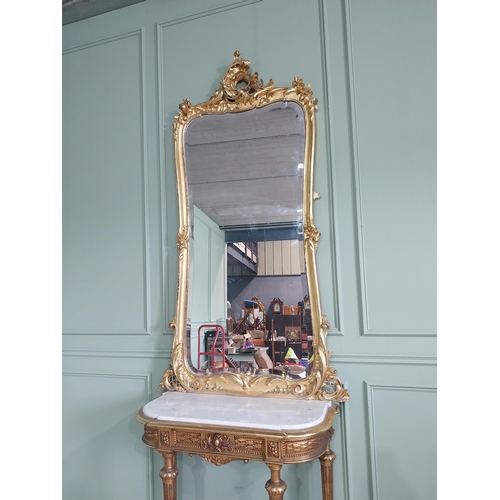 1402 - 19th C. French giltwood pier mirror surmounted with flowers. {186 cm H x 102 cm W}.