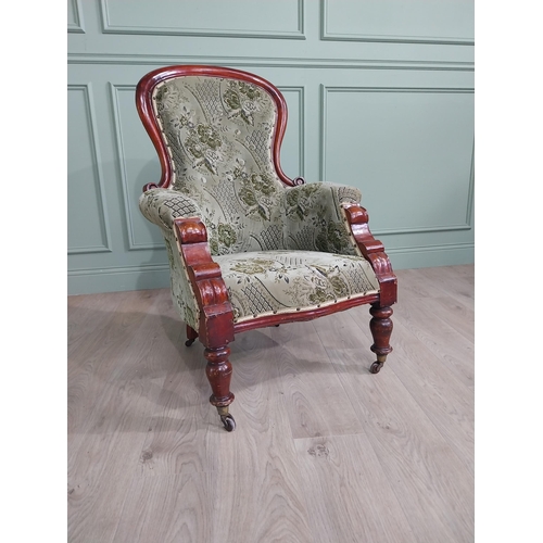 1408 - 19th C. mahogany and upholstered armchair raised on turned legs and castors {105 cm H x 73 cm W x 66... 