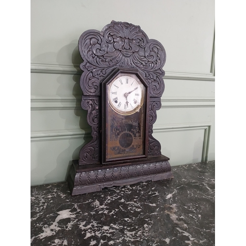 1410 - 19th C. carved pine and ebonised ginger bread clock with enamel dial {61 cm H x 41 cm W x 11 cm D}.