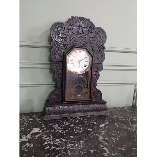 1410 - 19th C. carved pine and ebonised ginger bread clock with enamel dial {61 cm H x 41 cm W x 11 cm D}.