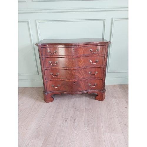 1413 - 19th C. mahogany serpentine front chest of drawers with four graduated drawers raised on bracket fee... 