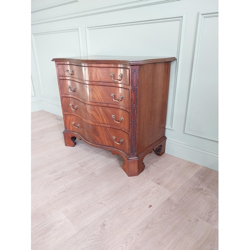 1413 - 19th C. mahogany serpentine front chest of drawers with four graduated drawers raised on bracket fee... 