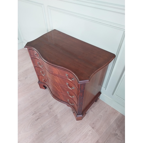 1413 - 19th C. mahogany serpentine front chest of drawers with four graduated drawers raised on bracket fee... 