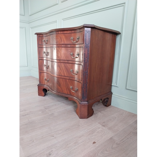 1413 - 19th C. mahogany serpentine front chest of drawers with four graduated drawers raised on bracket fee... 