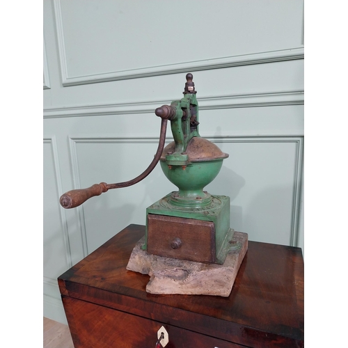 150 - Early 20th C. cast iron coffee grinder {48 cm H x 25 cm W x 40 cm D}.