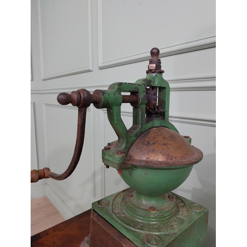 150 - Early 20th C. cast iron coffee grinder {48 cm H x 25 cm W x 40 cm D}.