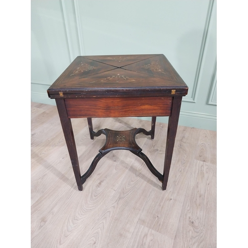 153 - 19th C. rosewood envelope card table with bone inlay {66 cm H x 56 cm W x 56 cm D}.