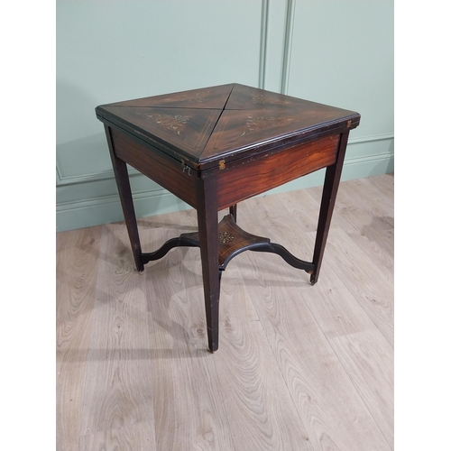 153 - 19th C. rosewood envelope card table with bone inlay {66 cm H x 56 cm W x 56 cm D}.