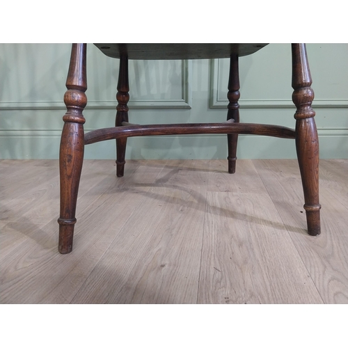 159 - Set of six early 20th C. ash and elm Windsor armchairs raised on carved legs {106 cm H x 58 cm W x 5... 