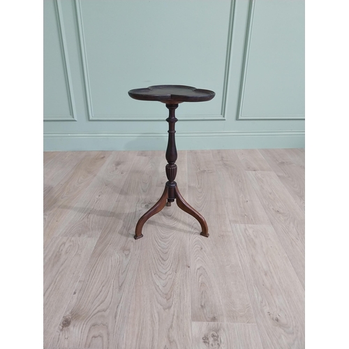 160 - Edwardian mahogany shamrock wine table raised on turned column and three out swept feet {58 cm H x 3... 