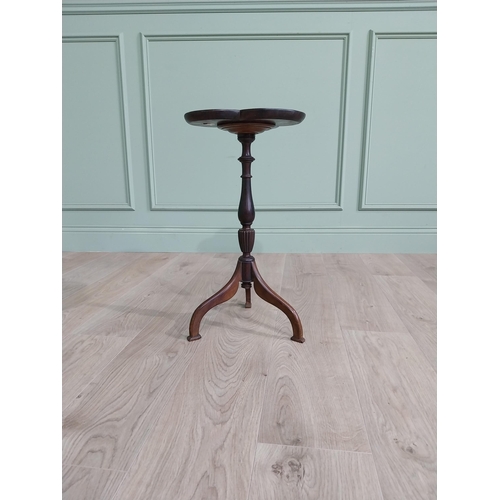 160 - Edwardian mahogany shamrock wine table raised on turned column and three out swept feet {58 cm H x 3... 