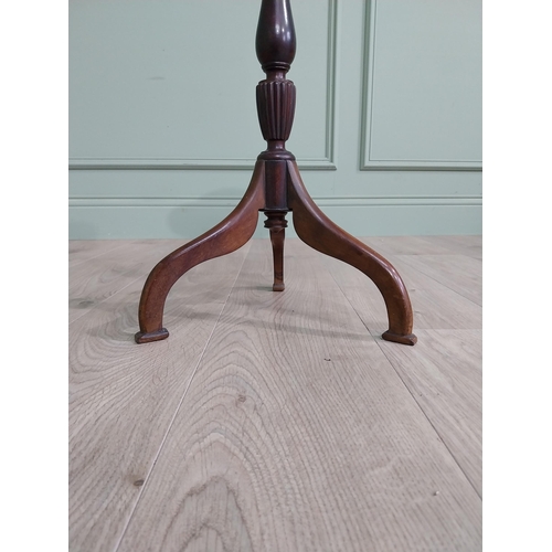 160 - Edwardian mahogany shamrock wine table raised on turned column and three out swept feet {58 cm H x 3... 