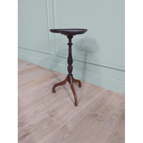 160 - Edwardian mahogany shamrock wine table raised on turned column and three out swept feet {58 cm H x 3... 