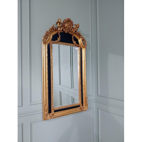 166 - Decorative French gilt wall mirror in the Victorian style {151 cm H x 80 cm W}.