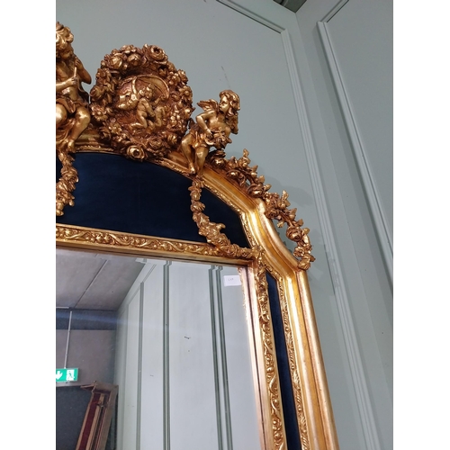 166 - Decorative French gilt wall mirror in the Victorian style {151 cm H x 80 cm W}.