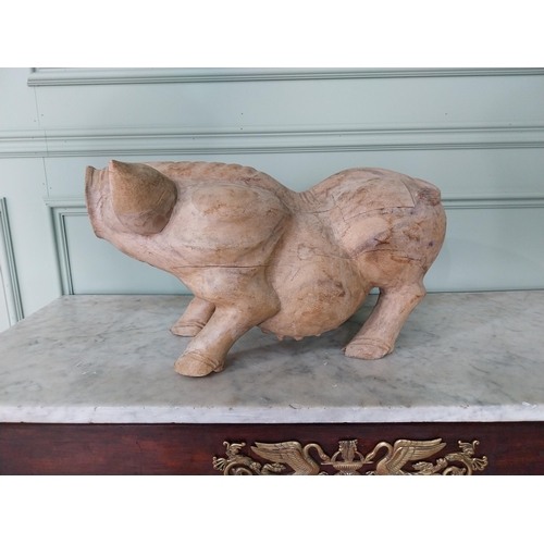 173 - Carved hardwood model of a Pig {27 cm H x 54 cm W x 20 cm D}.