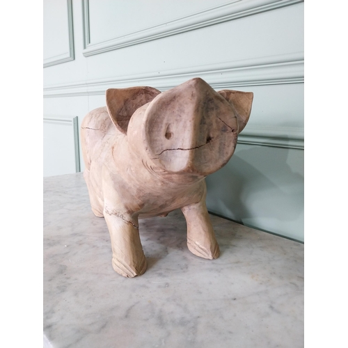 174 - Carved hardwood model of a Pig {27 cm H x 54 cm W x 20 cm D}.