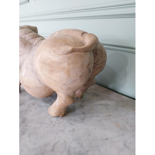 174 - Carved hardwood model of a Pig {27 cm H x 54 cm W x 20 cm D}.