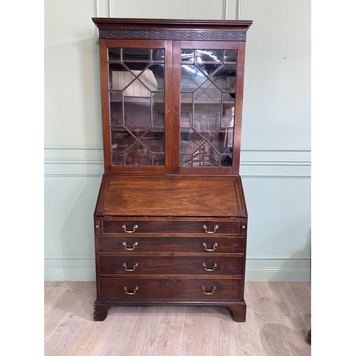 186 - Irish Georgian mahogany astral glazed bureau bookcase with satinwood fitted interior and four gradua... 