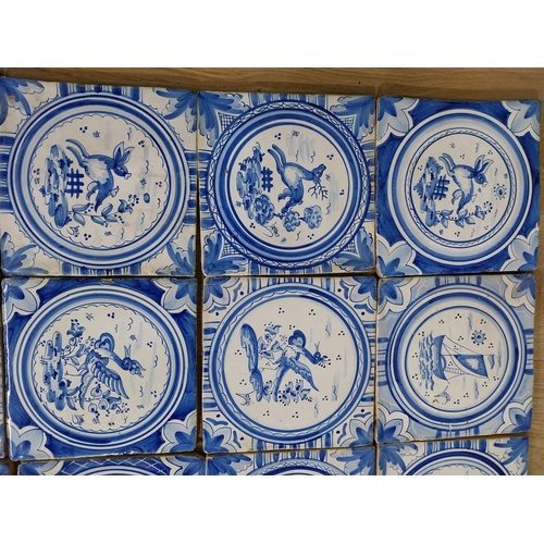 188 - Collection of twenty Dutch hand painted blue and white ceramic tiles {20 cm H x 20 cm W each}.