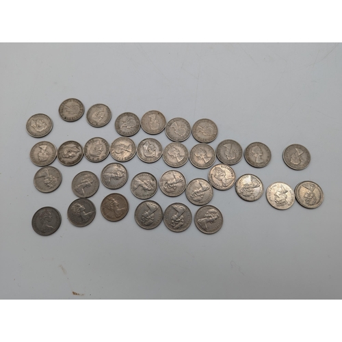 1907 - Collection of seventeen shillings (late 1940's to early 1960's) and approx. sixeen 5p coins