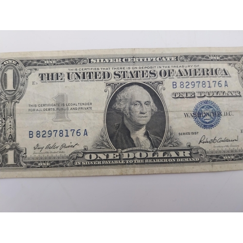 1927 - 1968 Portugese 50 Escudos note and a 1957 $1 bill, USA