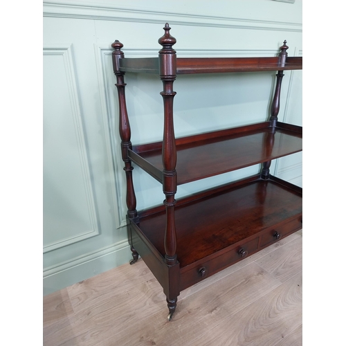 193 - Good quality 19th C. mahogany three tiered dumb waiter with two short drawers raised on turned feet ... 