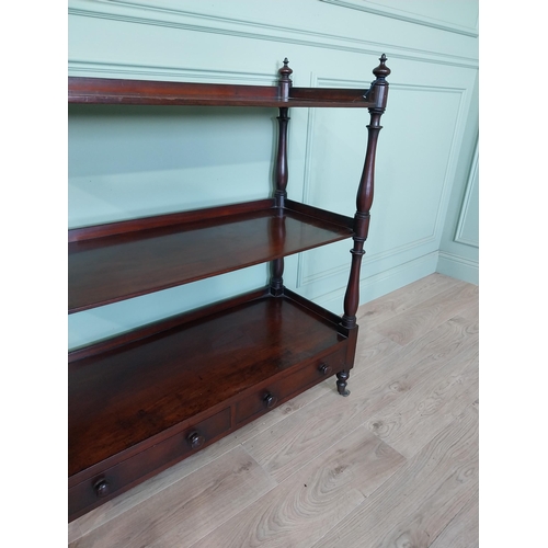 193 - Good quality 19th C. mahogany three tiered dumb waiter with two short drawers raised on turned feet ... 