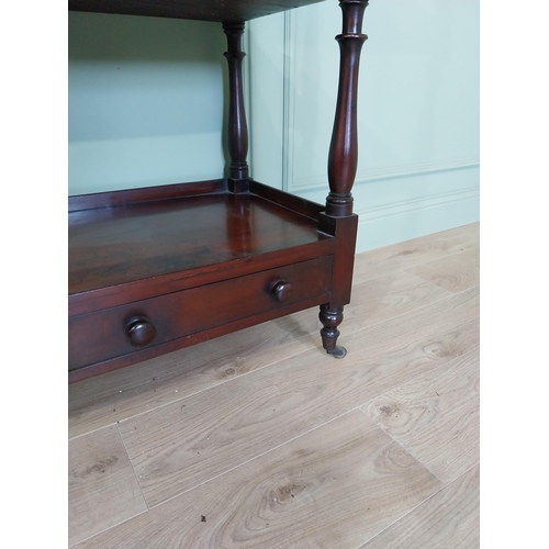 193 - Good quality 19th C. mahogany three tiered dumb waiter with two short drawers raised on turned feet ... 