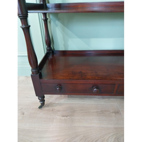 193 - Good quality 19th C. mahogany three tiered dumb waiter with two short drawers raised on turned feet ... 