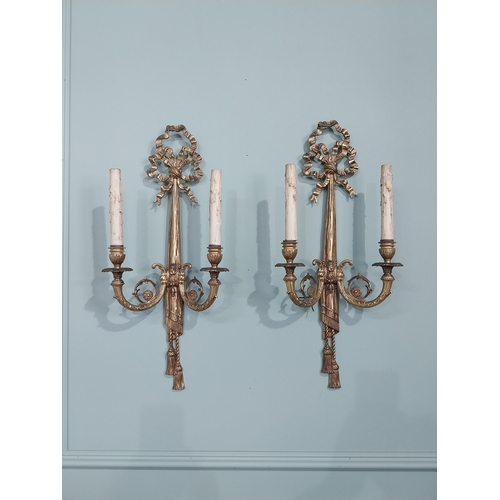 194 - Pair of good quality early 20th C. gilded brass French wall sconces {59 cm H x 27 cm W x 12 cm D}.